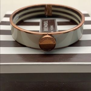 Henri Bendel bangle, white enamel, rose gold trim